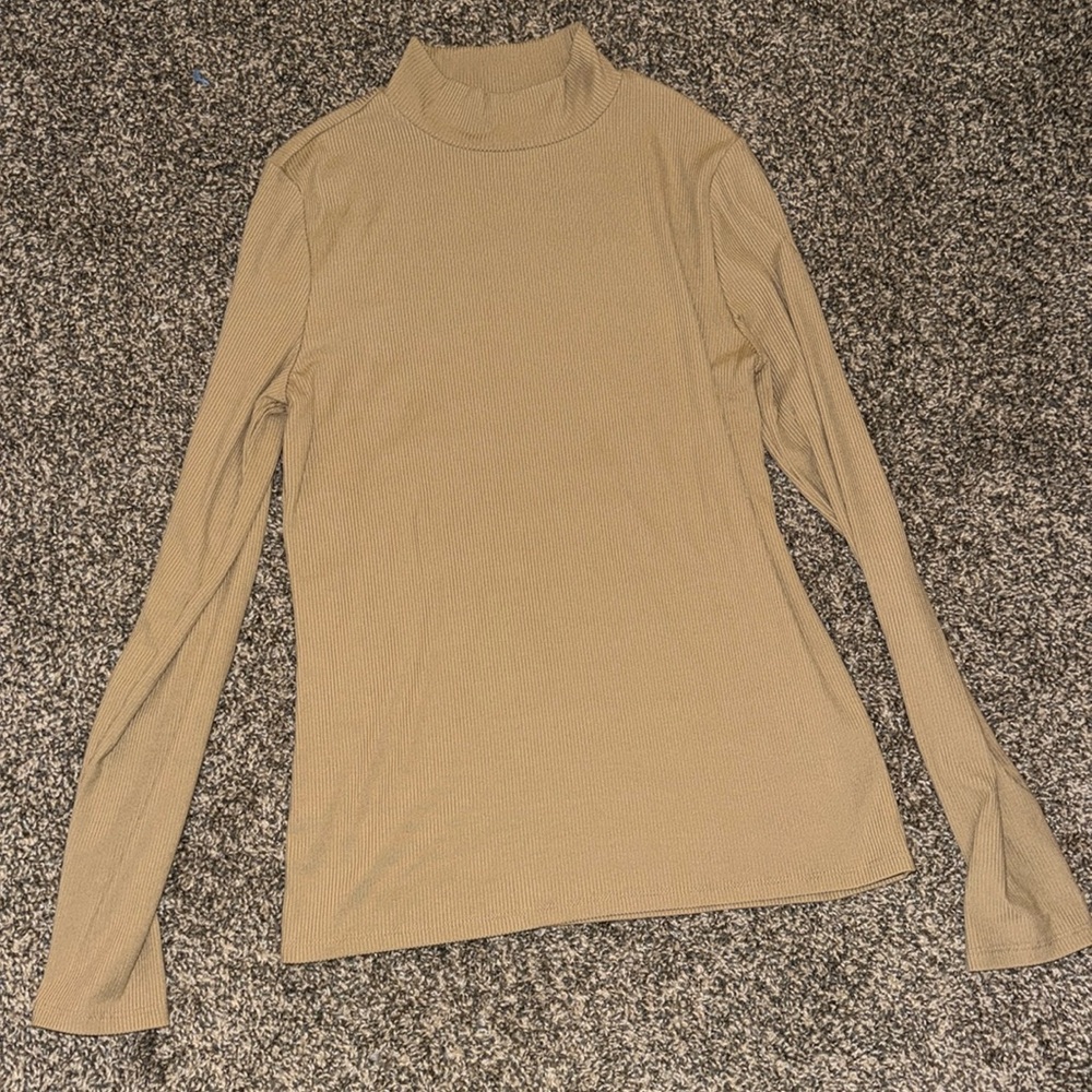 Tan, tight fitted, ribbed turtle neck!